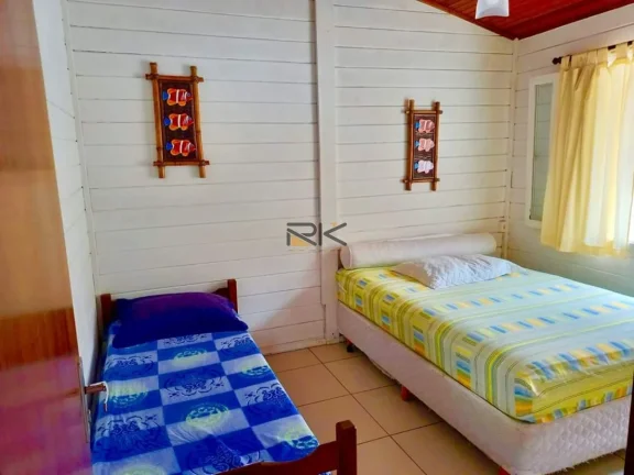 Imagem CASA A VENDA NAS TONINHAS COM 2 DORMITÓRIOS SENDO 1 SUÍTE,SALA DE ESTAR,COZINHA E 2 VAGAS DE GARAGEM