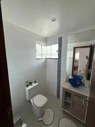Imagem Casa com 3 dormitórios sendo 1 suíte e 4 vagas de garagem em Balneário Camboriú/SC