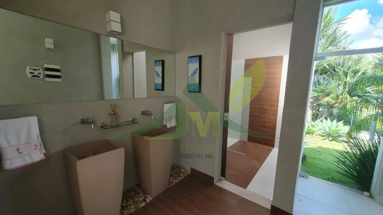 Imagem Mansão de Luxo no Condomínio Flamboyant: Exclusividade e Sofisticação em At
