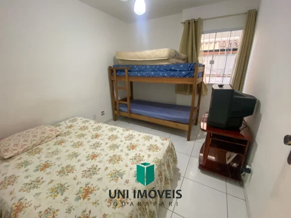 Imagem Apartamento Primeiro andar à Venda em Guarapari - Frente para rua - com área externa lateral