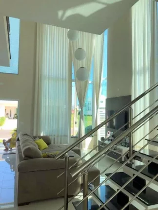 Imagem BELISSIMO SOBRADO EM CONDOMINIO FECHADO COM 5 SUITES