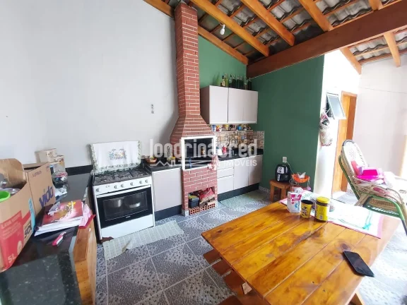 Imagem Casa à Venda na Zona Leste – 2 Quartos, Área Gourmet, Garagem Coberta e Ótima Localização! Perto de Escolas, Mercados e Farmácias. Agende sua Visita!