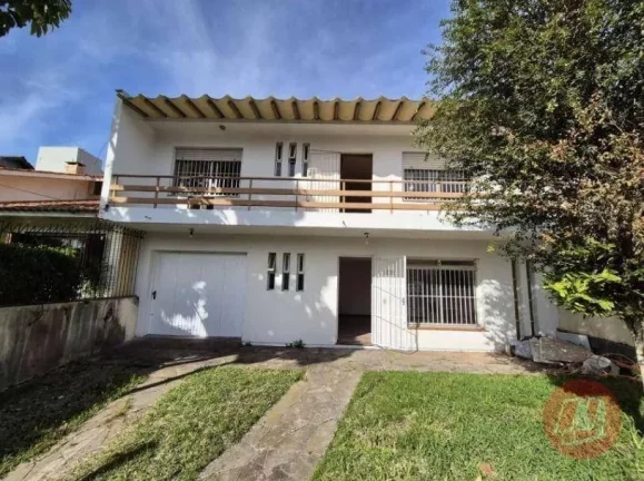 Imagem Casa com 3 dormitórios para alugar, 212 m² por R$ 6.583,33/mês - Chácara das Pedras - Porto Alegre/RS