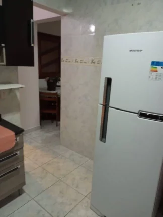 Imagem Casa com 2 dormitórios à venda, 72 m² por R$ 450.000 - Caiçara - Praia Grande/SP