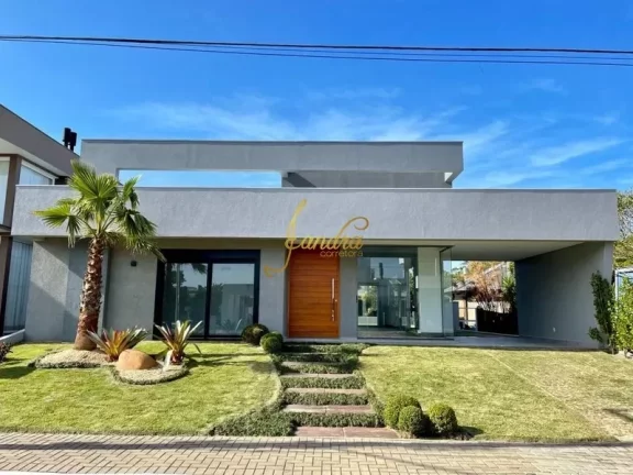 Imagem Casa térrea em condomínio fechado com 04 suites