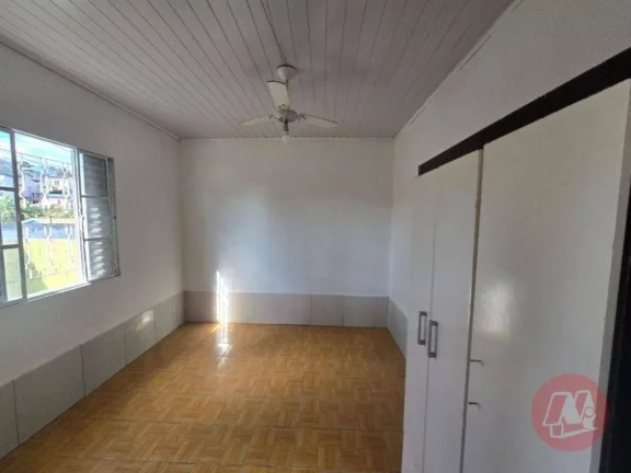 Imagem Casa com 2 dormitórios para alugar, 58 m² por R$ 1.615,00/mês - Medianeira - Porto Alegre/RS