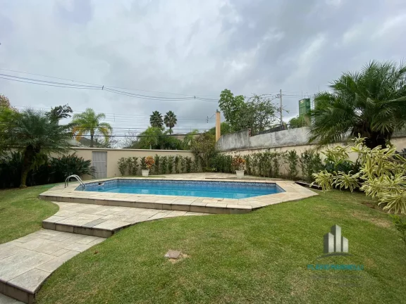 Imagem Melville Belíssima Casa de Esquina de 462m² com 4 Suítes e 6 Vagas de Garagem