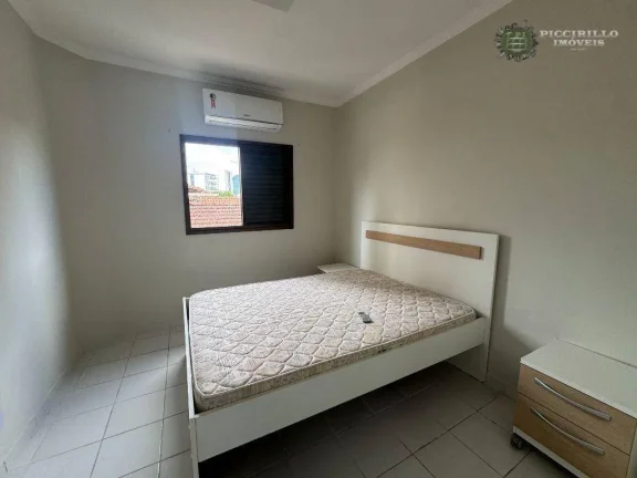 Imagem Casa de condomínio com 2 dormitórios à venda, 62 m² por R$ 430.000 - Vila Guilhermina - Praia Grande/SP