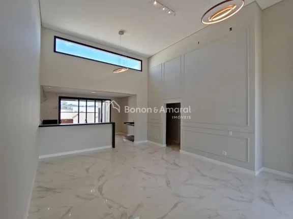 Imagem Com arquitetura moderna e ambientes aconchegantes, esta residência oferece um living integrado para...