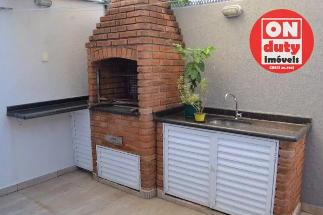 Imagem Sobrado à venda, 122 m² por R$ 1.350.000,00 - Ponta da Praia - Santos/SP