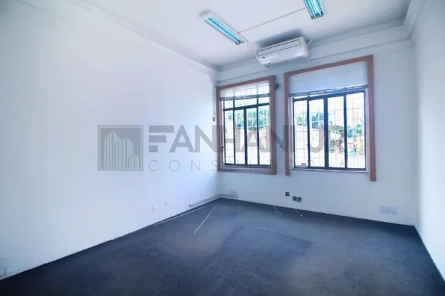 Imagem Casa Comercial de Alto Padrão para Locação no Jardim América, São Paulo-SP: 6 Salas, 6 Banheiros, 20 Vagas - 824m²!