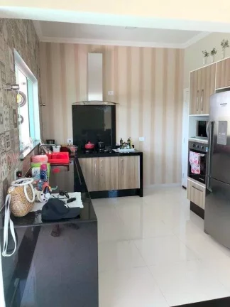 Imagem BELISSIMO SOBRADO EM CONDOMINIO FECHADO COM 5 SUITES