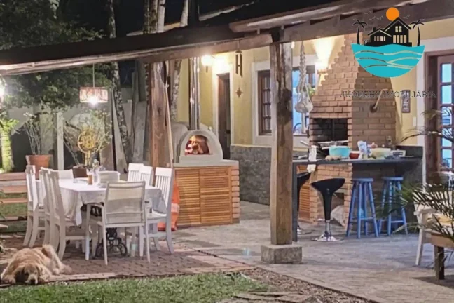 Imagem Casa bem localizada - Praia de Juquehy, 100 metros da praia, piscina, churrasqueira, 6 dormitórios, acomoda 14 pessoas | Juquehy Imobiliária