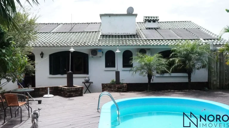 Imagem Casa à venda em bairro residencial com 3 dormitórios, suíte, 4 vagas de garagem,