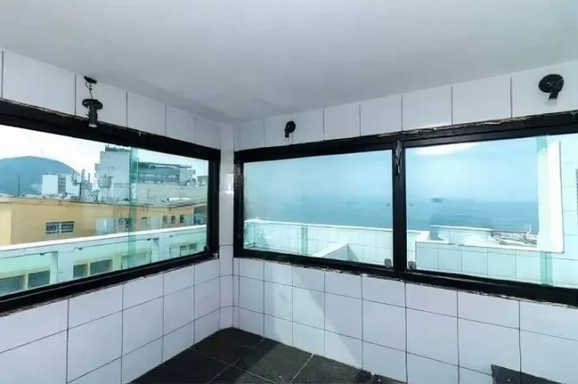 Imagem Cobertura triplex Copacabana vista total Mar sol da manhã, oportunidade