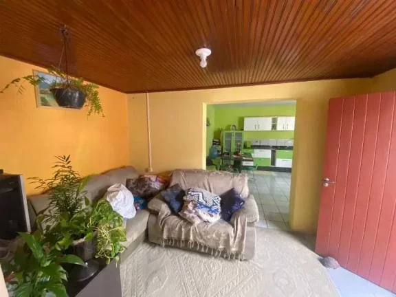 Imagem Casa com 3 dormitórios sendo 1 suíte e 3 vagas de garagem no Centro de Porto Belo