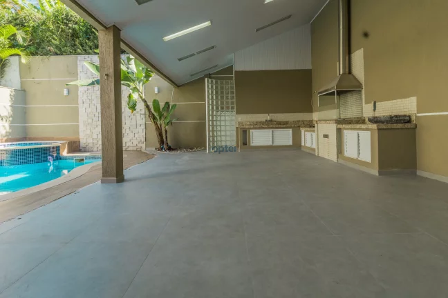 Imagem Casa de Alto Padrão 3 suítes, 4 vagas e Piscina à Venda no condomínio Forest Hills no bairro Anchieta