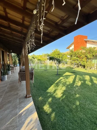 Imagem Casa à venda, no Brisas do Rio com Três quartos, piscina, jardim, muito verde