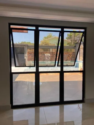 Imagem Casa nova de alto padrão com 4 suítes e 3 vagas de garagem em Itajaí/SC