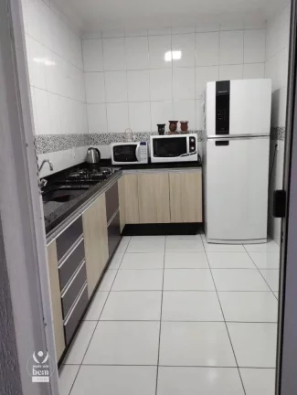 Imagem Lindo sobrado com 3 quartos sendo uma suíte, área gourmet com churrasqueira, 2 vagas de garagem á venda por R$ 549.000 - Uberaba - Curitiba.