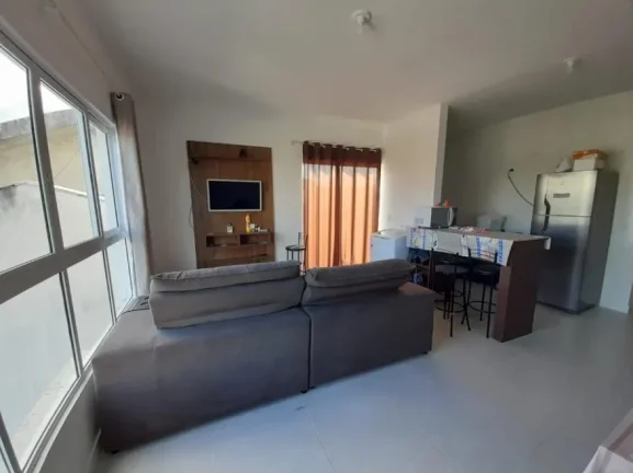 Imagem Apartamento com 1 suíte mas 1 dormitório no bairro Gravatá de Navegantes com churrasqueira a carvão e terraço a venda com Adriano Carpes Imóveis.