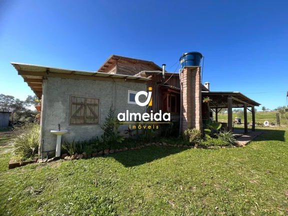 Imagem Chácara 3 dormitórios à venda Zona Rural Butiá/RS