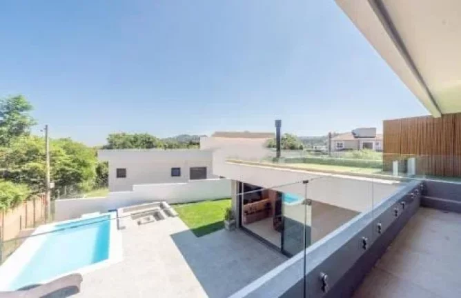 Imagem Casa em Condomínio com 5 dormitórios sendo 4 suites 340m²,