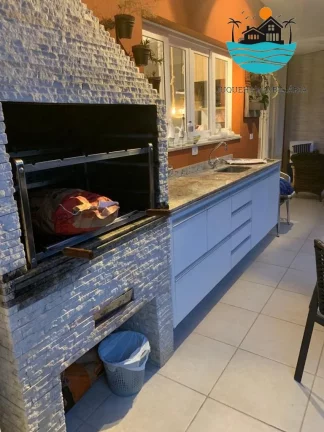 Imagem Casa em condomínio para locação em Juquehy com 4 suítes, Acomoda 12 pessoas a 150 metros da praia | Juquehy Imobiliária