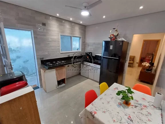 Imagem Espaçosa Casa Geminada no Mirim Praia Grande – 2 Quartos e Piscina