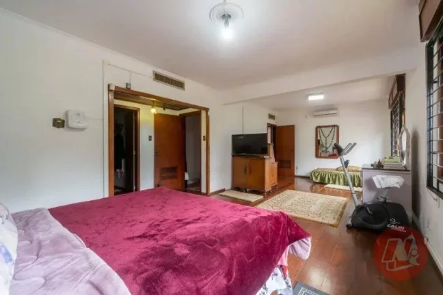 Imagem Casa com 3 dormitórios, 299 m² - venda por R$ 2.385.000,00 ou aluguel por R$ 23.499,00/mês - Boa Vista - Porto Alegre/RS