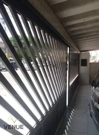 Imagem Casa com 2 dormitórios à venda, 87 m² por R$ 669.000,00 - Ponta da Praia - Santos/SP