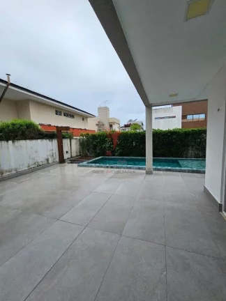 Imagem Casa com 4 Suites,para aluguel ,com piscina em condomínio horizontal