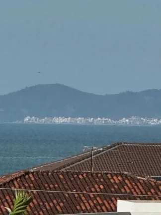 Imagem Terreno de 340m² com casa de 2 dormitórios e 1 vaga de garagem Zimbros