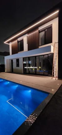 Imagem Casa Nova em condomínio fechado à venda com 5 suítes, 6 vagas de garagem localizada na Praia Brava .
