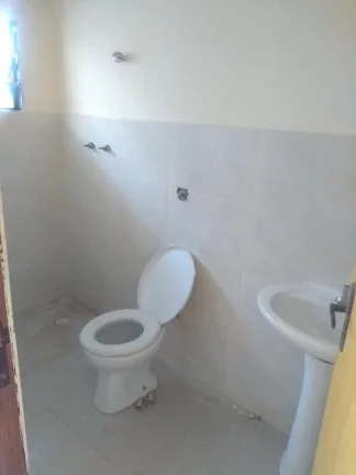 Imagem Casa de fundo com 1 quarto, sala, cozinha, banheiro e lavanderia.
 A Palace Imobiliária Ltda tem ma...