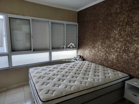 Imagem Apartamento com locação sem garantia frente mar Tombo com lazer: 2 salas, 2 banheiros, 1 vaga de garagem, 78m².