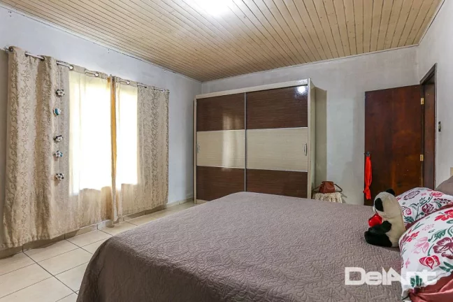 Imagem RESIDÊNCIA TÉRREA EM AMPLO TERRENO (600,00m2 - 15x40) - VILA MILITAR - 200,00m2 (aproximado) de CONSTRUÇÃO - R$ 460.000,00