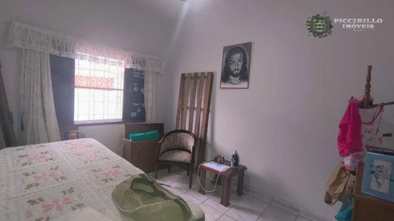 Imagem Casa com 3 dormitórios à venda, 240 m² por R$ 700.000,00 - Caiçara - Praia Grande/SP