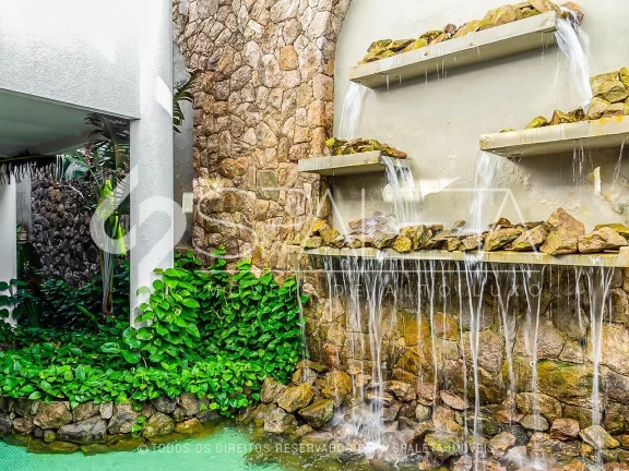 Imagem Belíssima mansão mobiliada com 10 suítes e vista para o mar à venda na Praia do Pernambuco no Guarujá