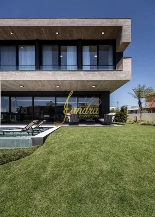 Imagem Casa condomínio com 05 suites e piscina beira de lago