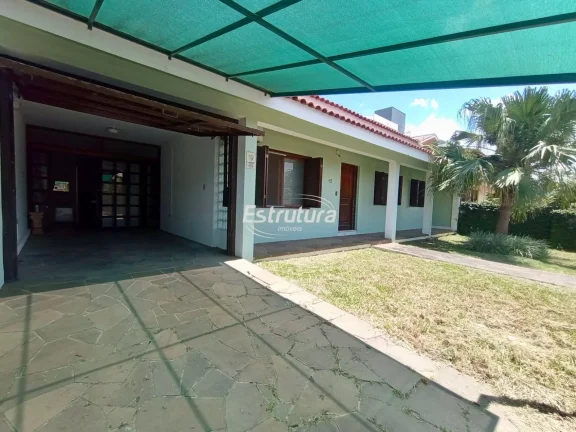 Imagem Encantadora Residência de 180m² em Camobi: 3 Quartos, Suíte com Closet, Área Gou