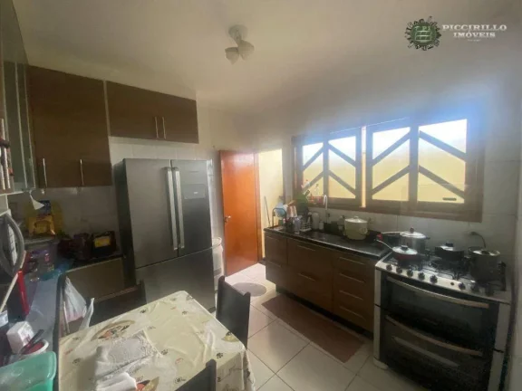 Imagem Sobrado com 3 dormitórios à venda, 110 m² por R$ 680.000,00 - Vila Guilhermina - Praia Grande/SP
