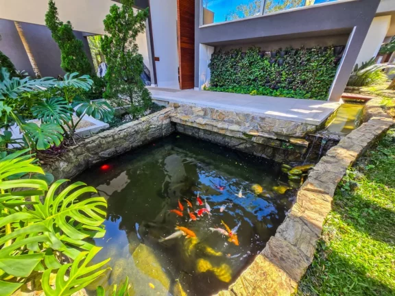 Imagem Imperdível casa à venda na Riviera de São Lourenço Módulo 12: 7 quartos, 7 suítes, 3 salas, 4 vagas, 642m² de área!