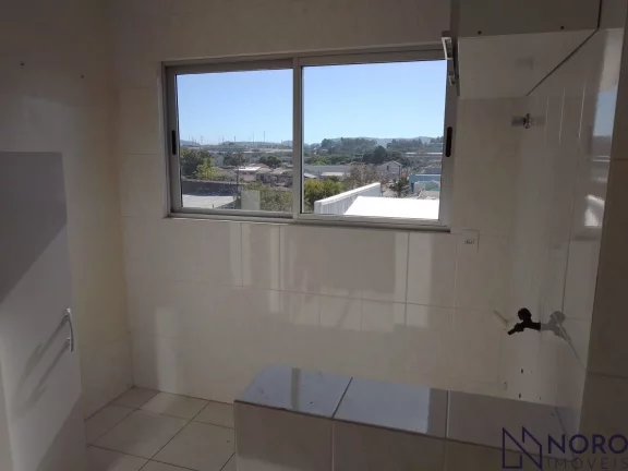 Imagem Apartamento 2 dormitórios, 1 suite, com box de garagem no bairro Tancredo Neves