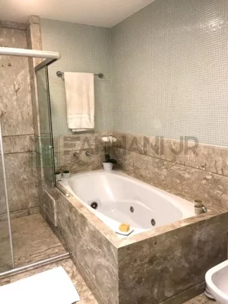Imagem Luxuoso Apartamento de 4 Quartos no Jardim Paulista com Suítes, 3 Salas e 4 Vagas de Garagem - São Paulo-SP