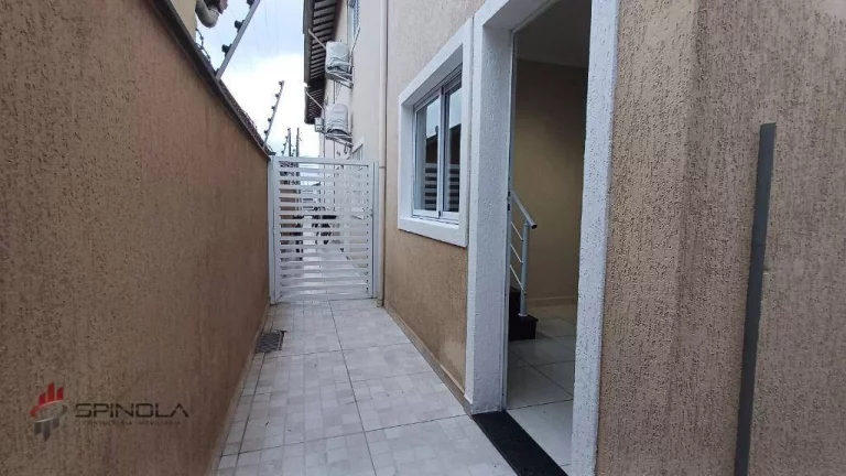 Imagem Sobrado com 2 dormitórios à venda, 58 m² por R$ 320.000,00 - Maracanã - Praia Grande/SP