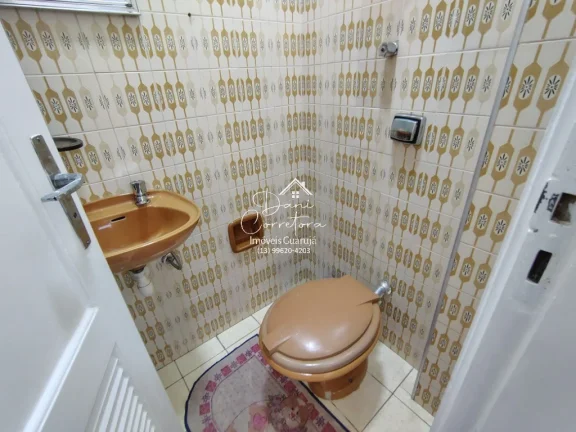 Imagem Imperdível! Apartamento de 3 quartos com suíte e 2 salas em Pitangueiras, Guarujá-SP. 100m² de conforto e elegância.