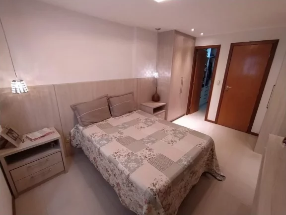 Imagem Excelente Apartamento de Frente para o Mar na Praia do Morro composto por 4 dormitório sendo 3 suítes, com 2 vagas de garagem.