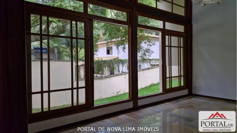 Imagem Casa a venda no condomínio Ipê da Serra, casa com armário e área de lazer com piscina. Venha conhecer no Portal de Nova Lima Imóveis - 31.98511-8000