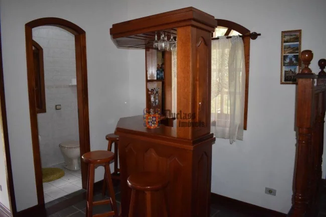 Imagem Casa com 3 dormitórios à venda, 292 m² por R$ 1.500.000 - Vila Inglesa - Campos do Jordão/SP